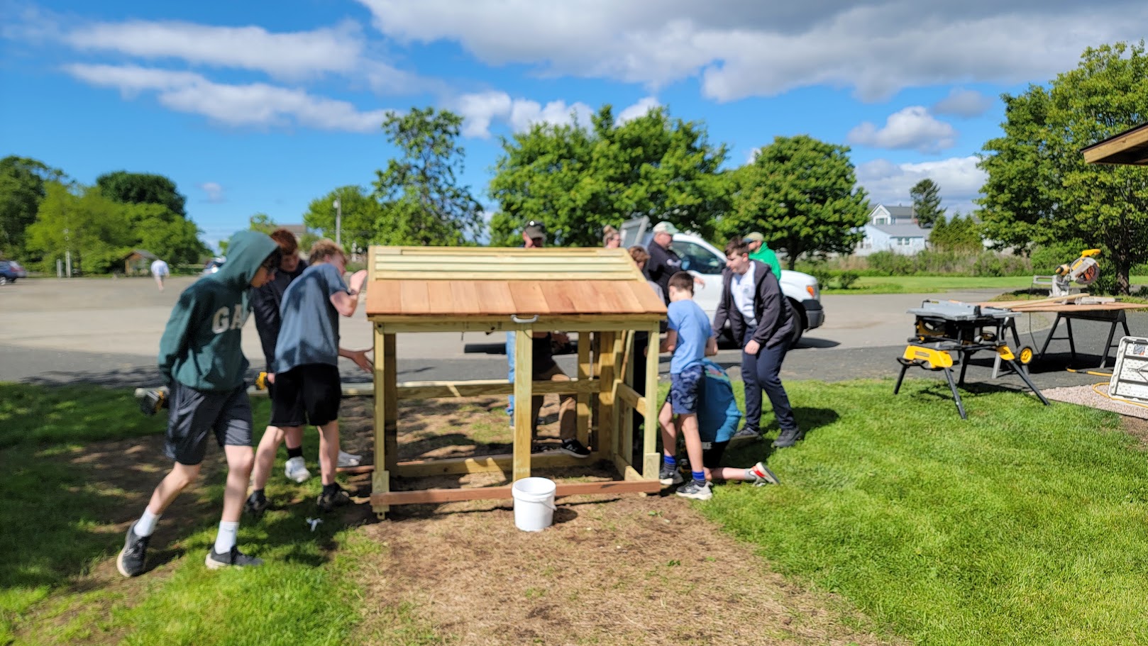 Troop members building during a service project.